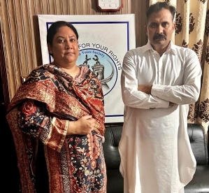 Haroon Shahzad (right) with attorney Aneeqa Maria, fighting blasphemy charges in Pakistan.