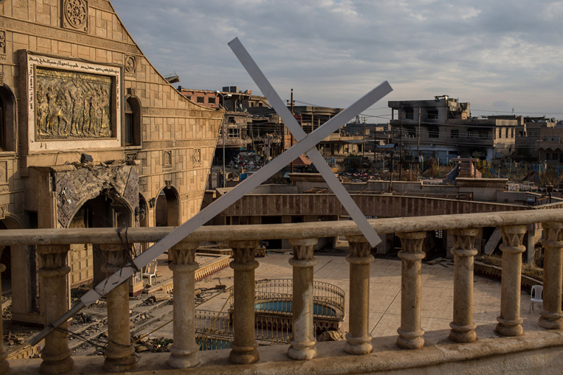 Church burnt by ISIS with cross on roof in Qaraqosh Iraq