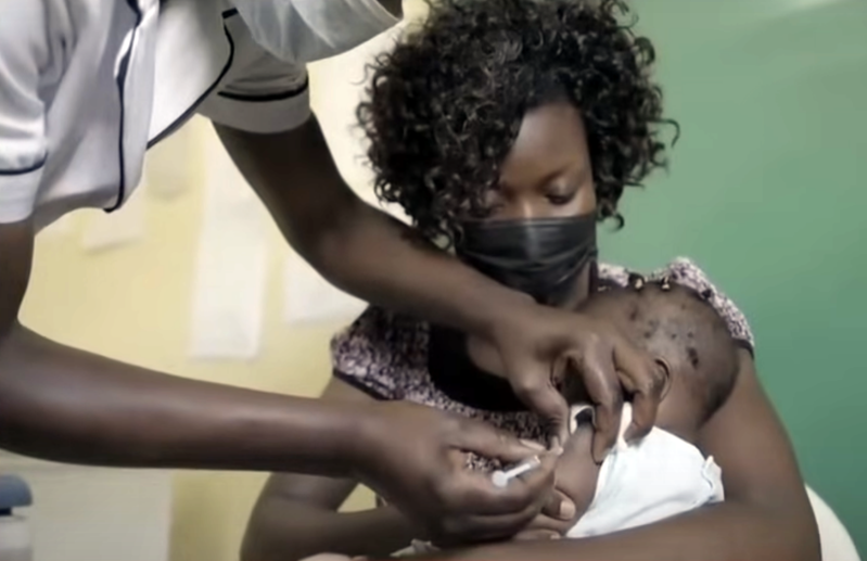 A malaria vaccine administered to a child in Cameroon