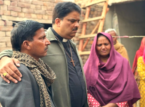 Bishop Abraham Daniel prays for victims of Feb. 12 attack in Sawihal District, Pakistan. 