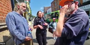 Police in Glastonbury, England on June 8 arrested John Dunn (R) and Shaun O’Sullivan for comments against homosexuality. 