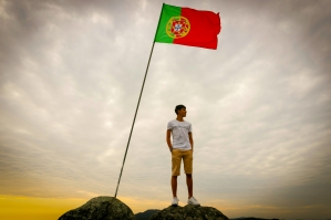 Young man and Portugal flag