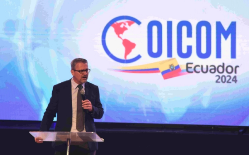 Arnold Enns, President of COICOM International during the opening plenary of the event in Guayaquil, Ecuador