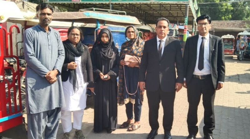 Diya Iftikhar (3rd from left) with parents and attorneys after her recovery. 