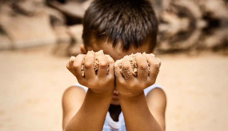 Child with sand