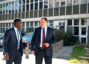 Adam Smith-Connor (right, with attorney) is appealing a conviction for breaching a U.K. “buffer zone” outside an abortion clinic. 