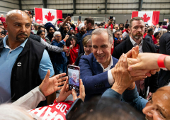 Mark Carney emphasizes humility after Liberals win Canada's national election, takes strong stand against Trump
