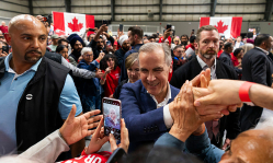 Mark Carney emphasizes humility after Liberals win Canada's national election, takes strong stand against Trump