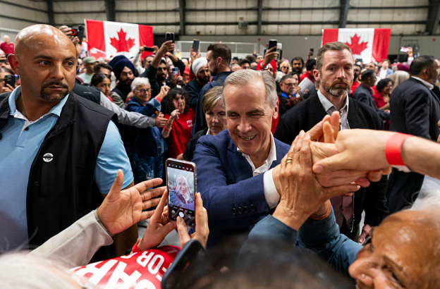 Mark Carney emphasizes humility after Liberals win Canada's national election, takes strong stand against Trump
