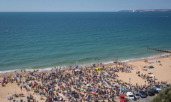 92 baptized in public mass ceremony on Bournemouth Beach, declaring faith in Jesus