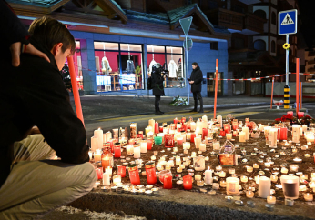 Churches across Switzerland to open doors on national day of mourning after deadly fire